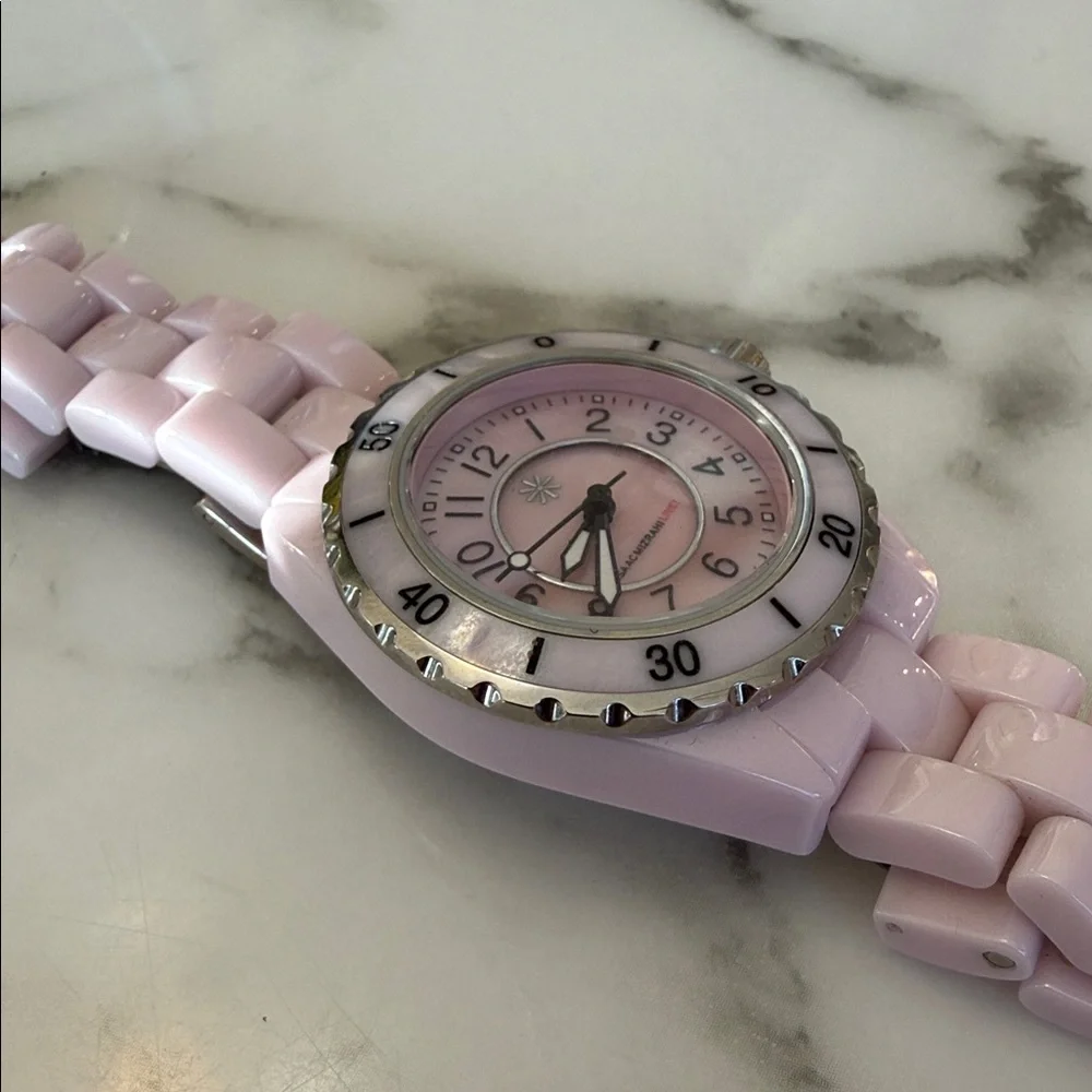Isaac Mizrahi Live women’s pink sport watch with bracelet style band